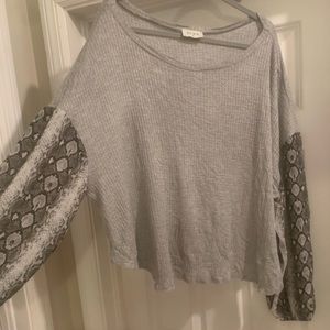 Sweater with snakeskin sleeves
